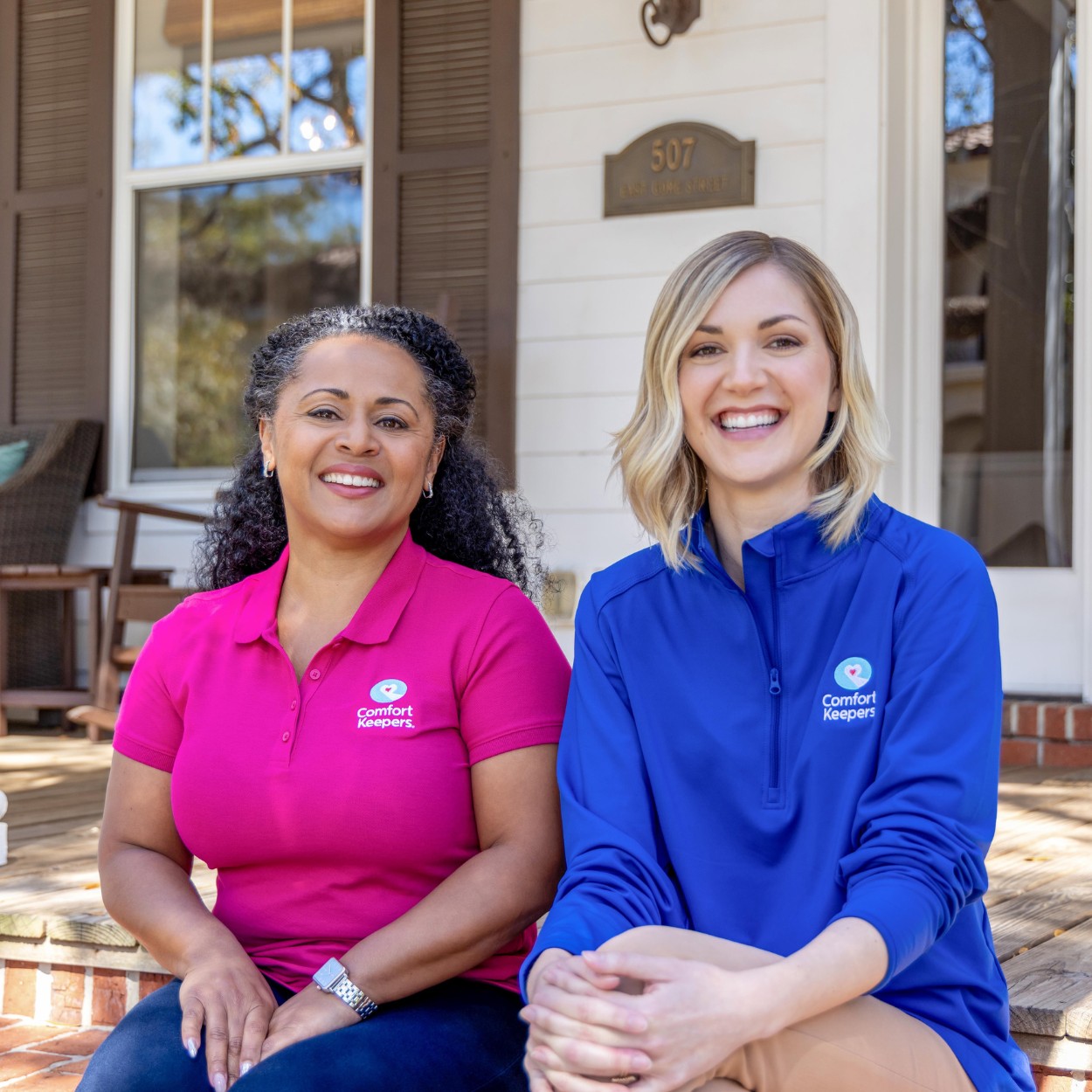 Comfort Keepers caregiver team sitting on the porch