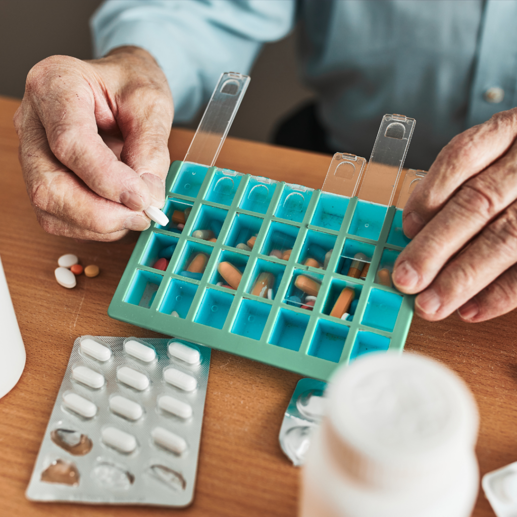 Senior sorting their medication | Comfort Keepers Calgary | BLOG POST | Medication Safety for Seniors