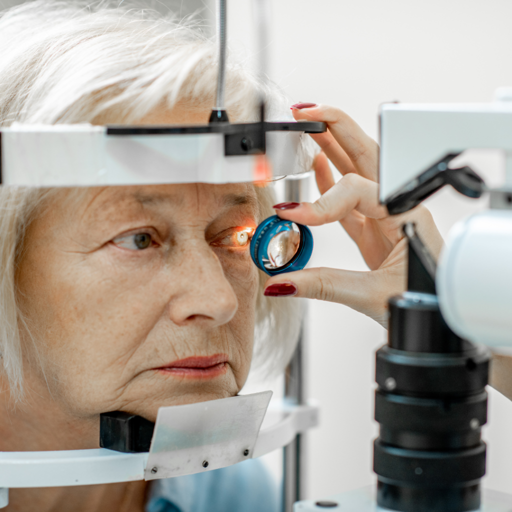 Senior Woman getting an eye exam | Comfort Keepers Calgary | BLOG POST | Why Routine Eye Exams are Crucial to Senior Health