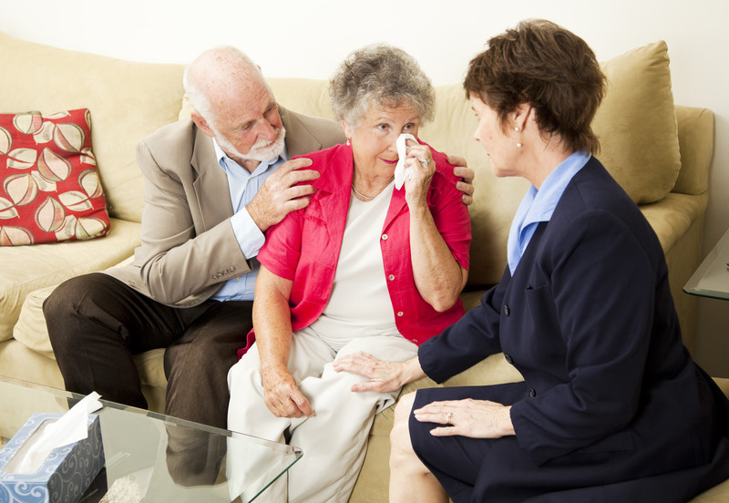 Emotional Senior sitting with caregiver | Comfort Keepers Calgary | BLOG POST | Seniors and isolation