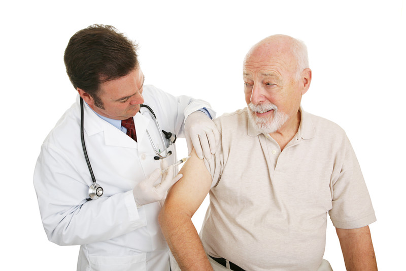 Senior male received vaccination from care provider | Comfort Keepers Calgary | BLOG POST | Senior Vaccinations