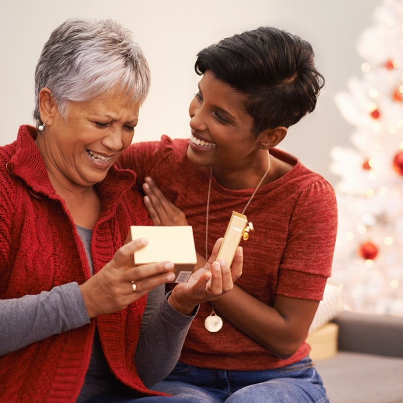 Senior Woman smiling with daughter | Comfort Keepers Calgary | Considering Respite Care | BLOG POST