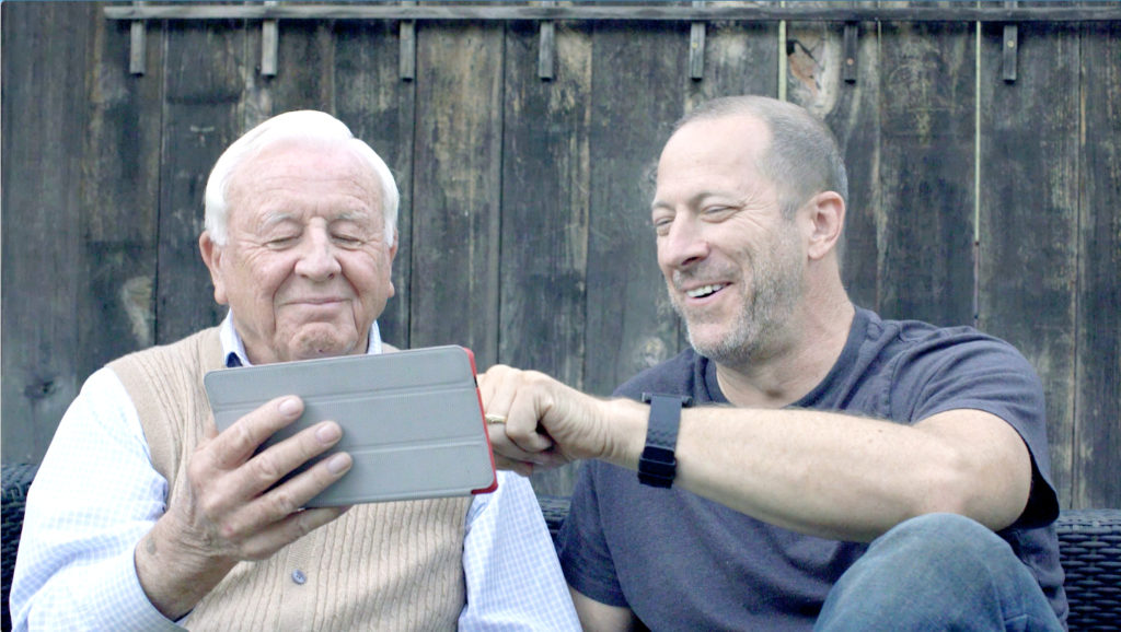 Senior Father with Adult Son smiling | Comfort Keepers Calgary | BLOG POST | Men in Calgary Are Affected by Osteoporosis Too