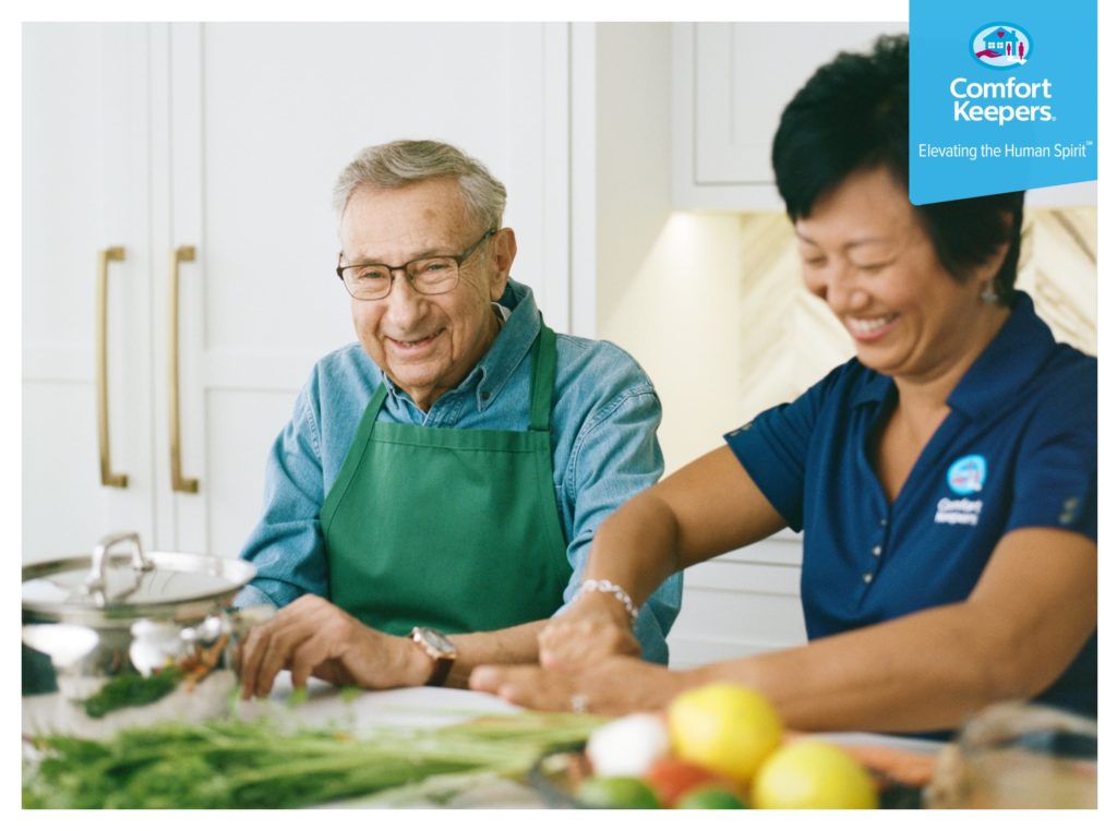 Senior male with caregiver preparing healthy foods | Comfort Keepers Calgary | BLOG POST | Healthy Grilling