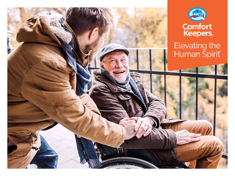 Senior male in wheelchair with outside with caregiver | Comfort Keepers Calgary | BLOG POST | The Importance of Stress-Free Environment for Heart Health