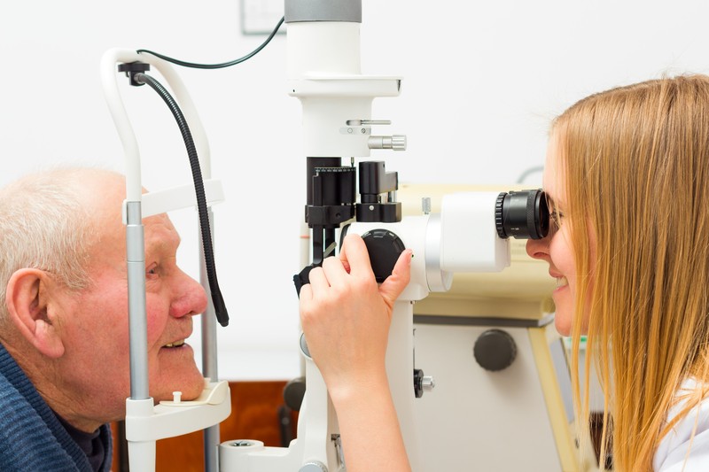 Senior male getting an eye exam | Comfort Keepers Calgary | BLOG POST | Home Care Services for Seniors with Glaucoma