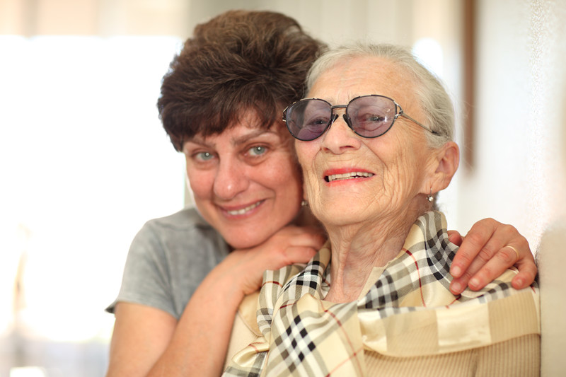 Senior with vision loss hugged by caregiver | Comfort Keepers Calgary | BLOG POST | Seniors with Vision Impairment