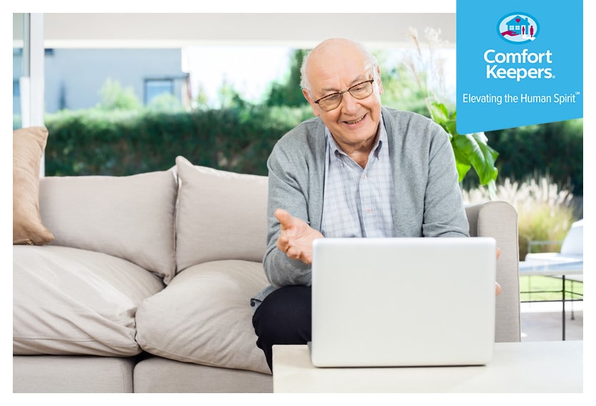 Senior Male seated on coach using technology | Comfort Keepers Calgary | BLOG POST | Seniors with Diabetes