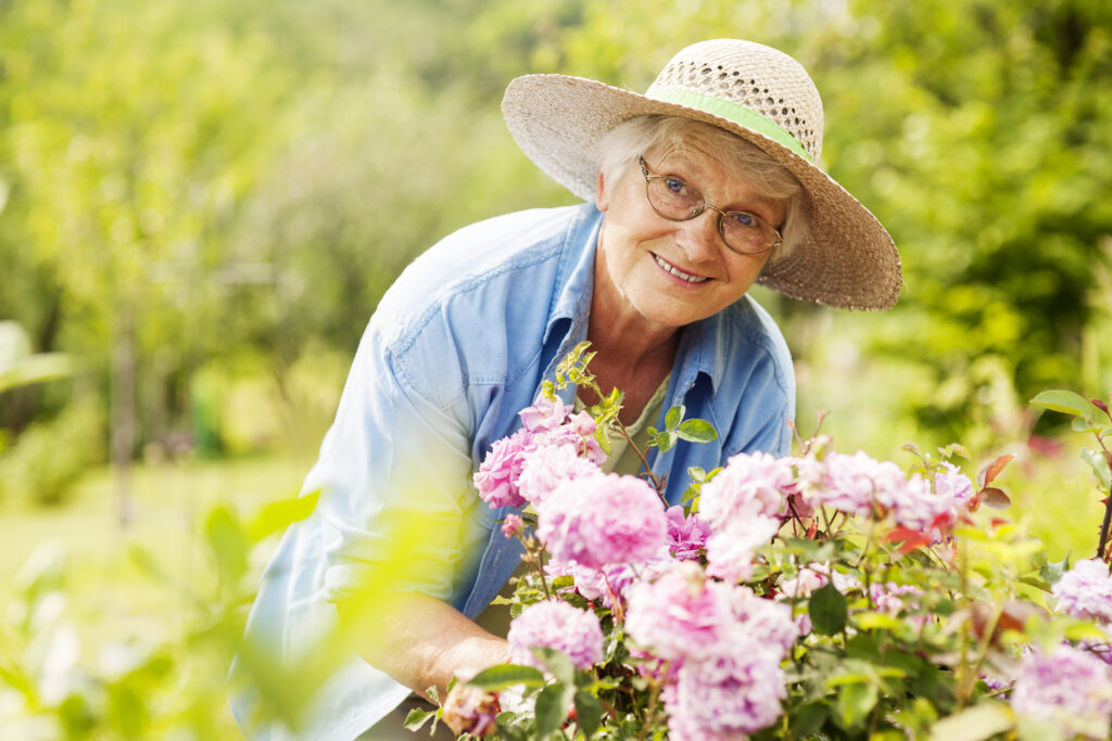 senior with flowers