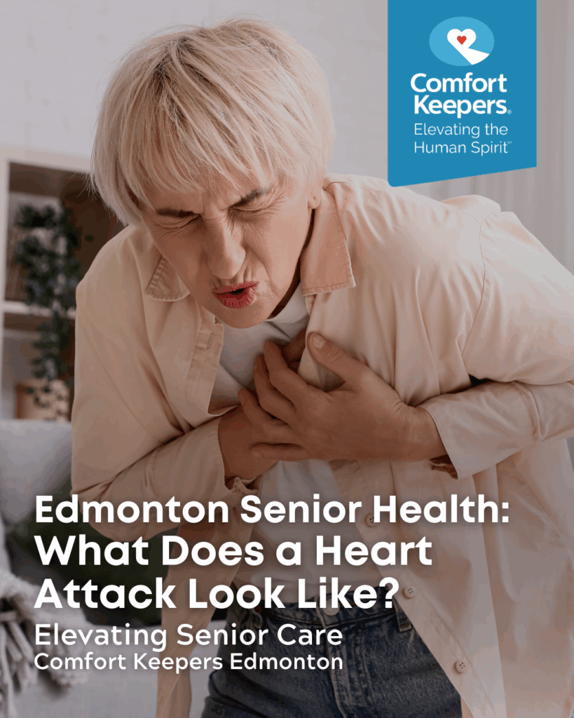 A senior woman clutches her chest seemingly having a heart attack | Edmonton Senior Health: What Does a Heart Attack Look Like? | Comfort Keepers Edmonton