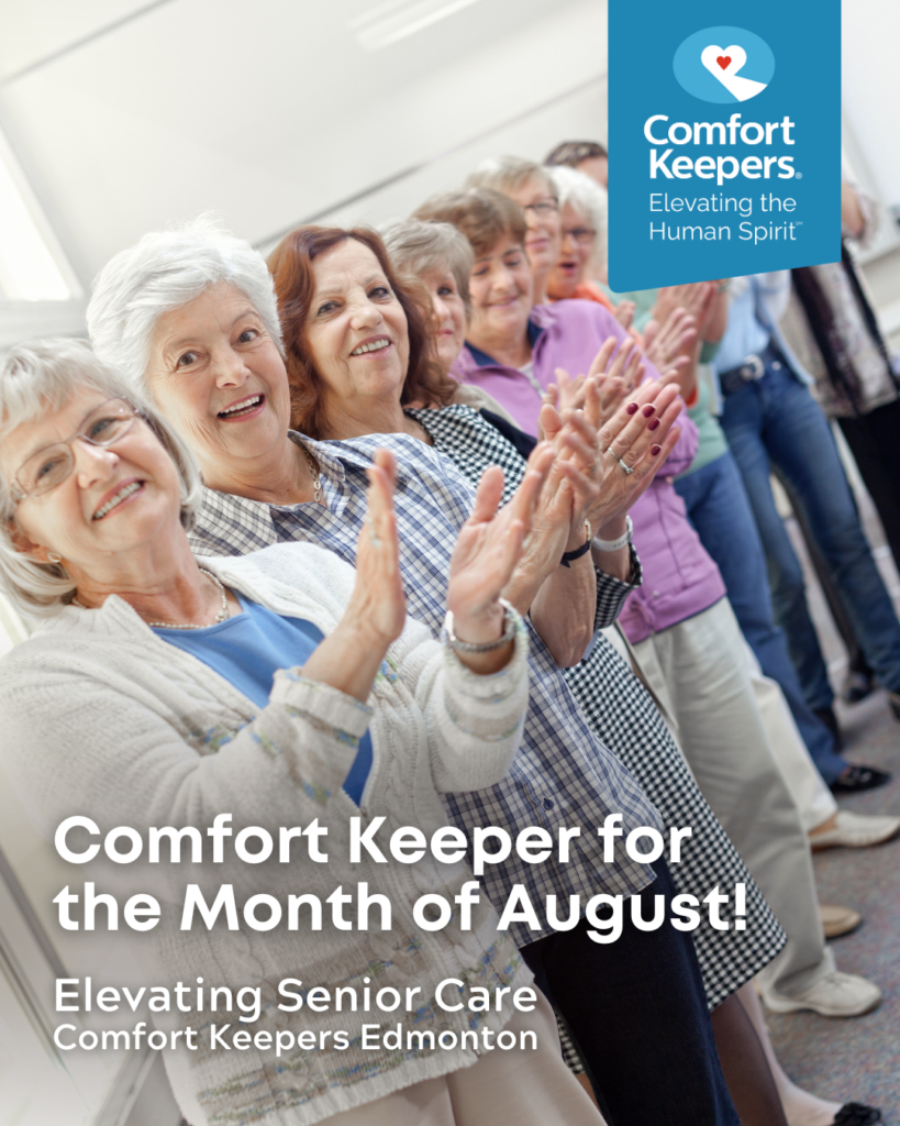 Line of women, including seniors, clapping in congratulations | Comfort Keeper for the Month of August | Comfort Keepers Edmonton | BLOG POST