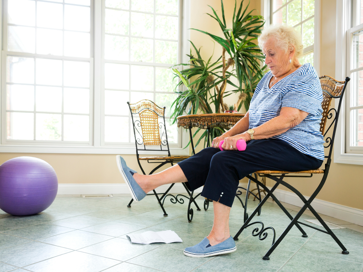 A senior woman exercises at home | Physical Activity for Senior Care in Edmonton | Comfort Keepers Edmonton
