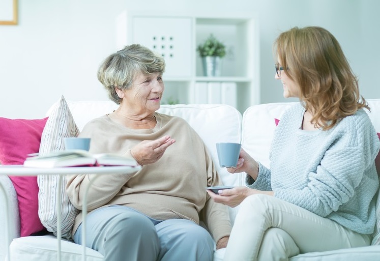 Senior and Caregiver enjoying tea on the couch | Home Care Solutions | Comfort Keepers Edmonton | BLOG POST