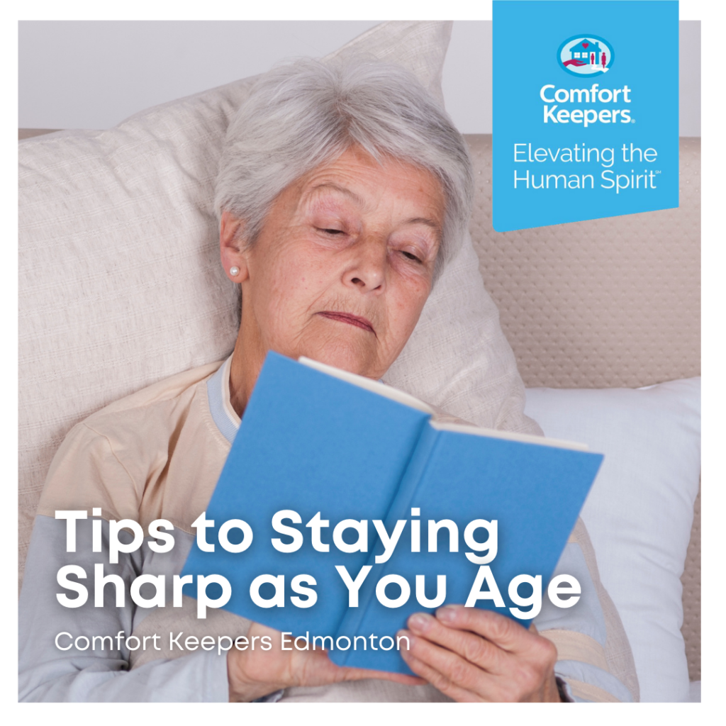 Senior in bed reading | Tips for Staying Sharp as You Age | BLOG POST | Comfort Keepers Edmonton
