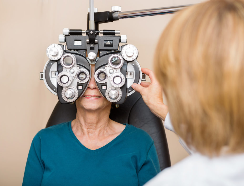 Senior receiving an eye exam | Cataract Exams and Seniors | Comfort Keepers Edmonton | BLOG POST