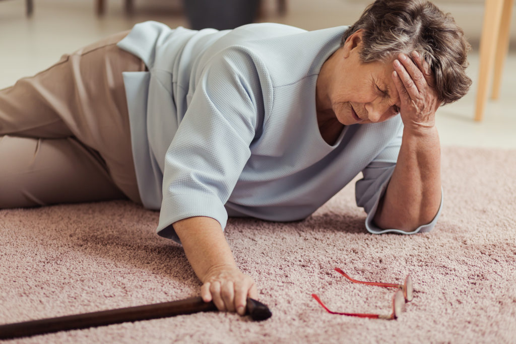 Seniors woman who has fallen to ground | Reduce the Risks of Seniors Falling | Comfort Keepers Edmonton | BLOG POST