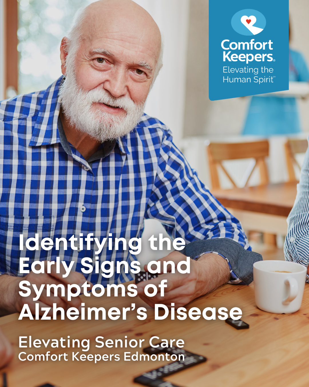 Senior male playing scrabble to improve cognitive function | Identifying the Early Signs and Symptoms of Alzheimer's Disease | Comfort Keepers Edmonton | BLOG POST