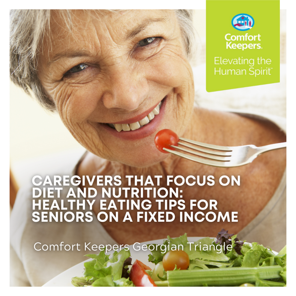 Senior women eating a salad and smiling at camera | Healthy Eating Tips for Seniors on a Fixed Income | Comfort Keepers Georgian Triangle | BLOG POST