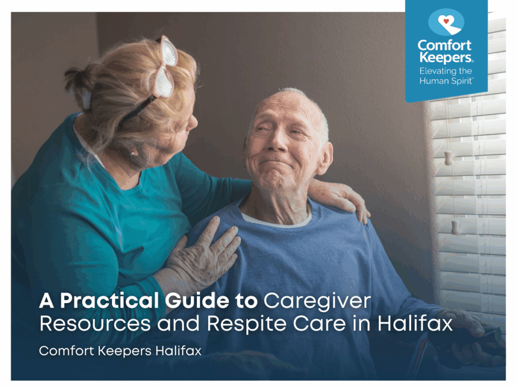 A senior male smiles up at his caregiver | A Practical Guide to Caregiver Resources and Respite Care in Halifax | Comfort Keepers Halifax