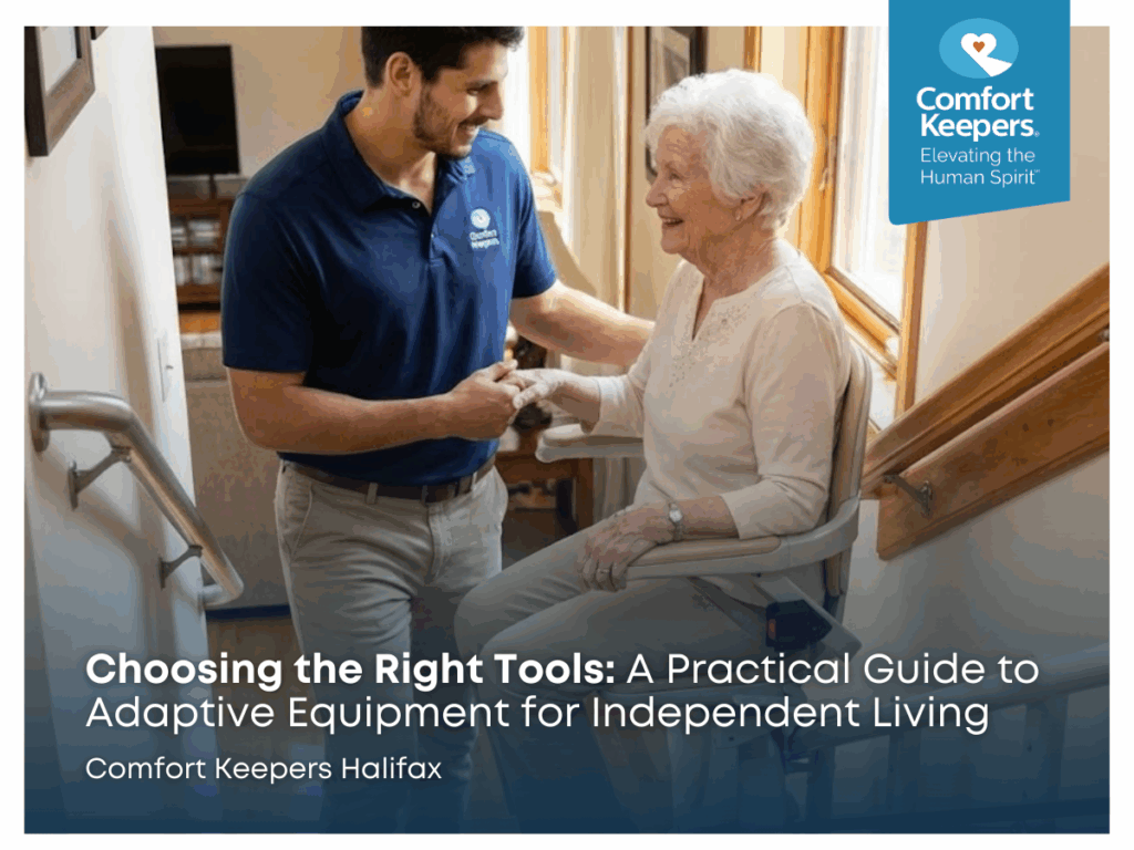 A senior woman going upstairs on a stairlift apparatus assisted by a caregiver | Choosing the Right Tools: A Practical Guide to Adaptive Equipment for Independent Living | Comfort Keepers Halifax