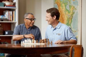 Don, the Comfort Keepers caregiver played chess with an elderly client at home