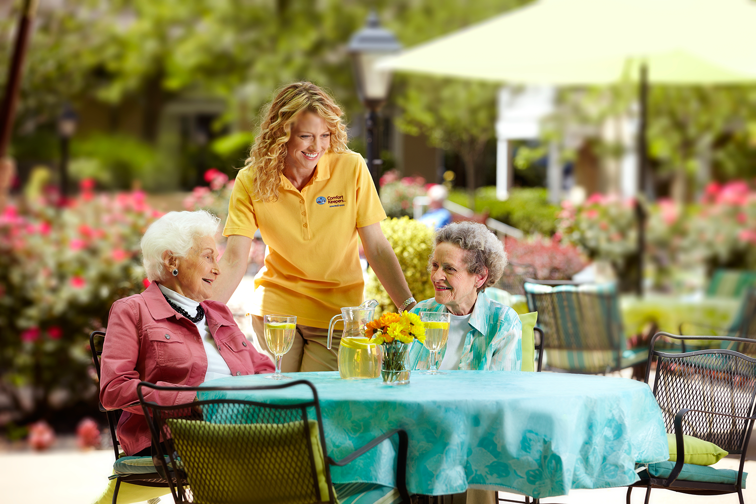 seniors outdoors with caregiver