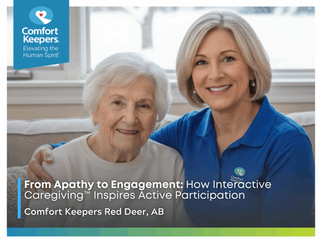 A senior woman with caregiver seated and smiling | From Apathy to Engagement: How Interactive Caregiving™ Inspires Active Participation | Comfort Keepers Red Deer 