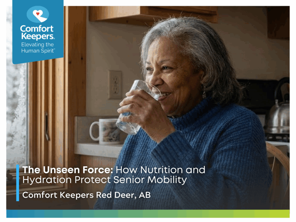 A senior woman drinking a glass of water | The Unseen Force: How Nutrition and Hydration Protect Senior Mobility | Comfort Keepers Red Deer