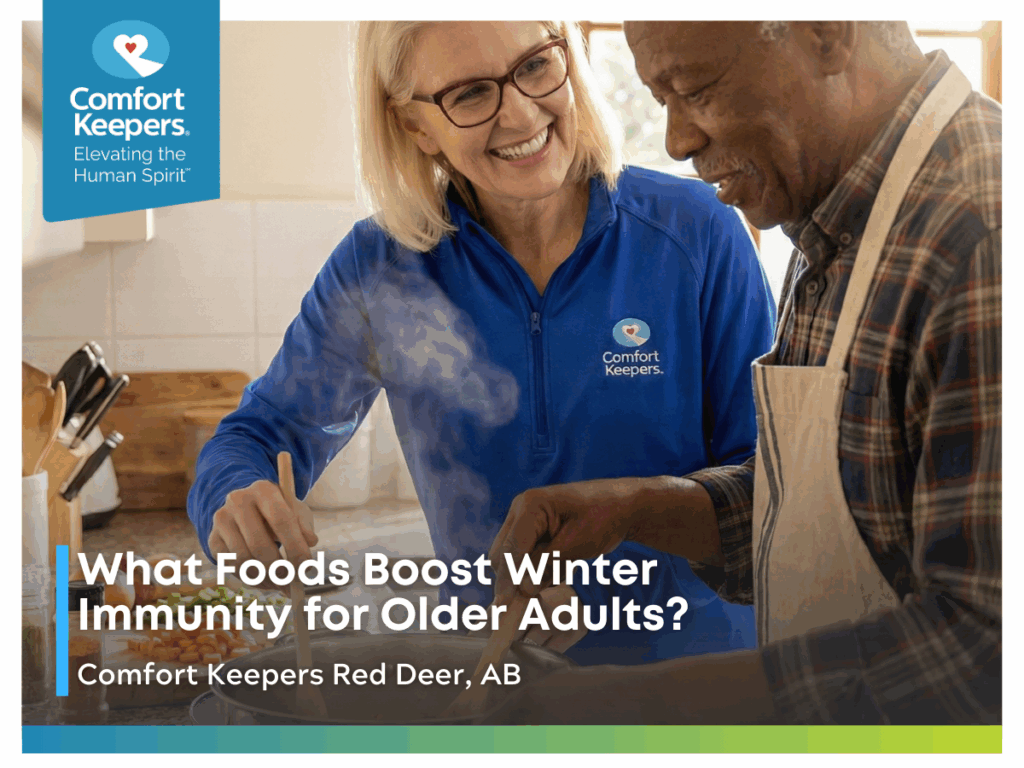 A senior male making soup with his caregiver | What Foods Boost Winter Immunity for Older Adults? | Comfort Keepers Red Deer