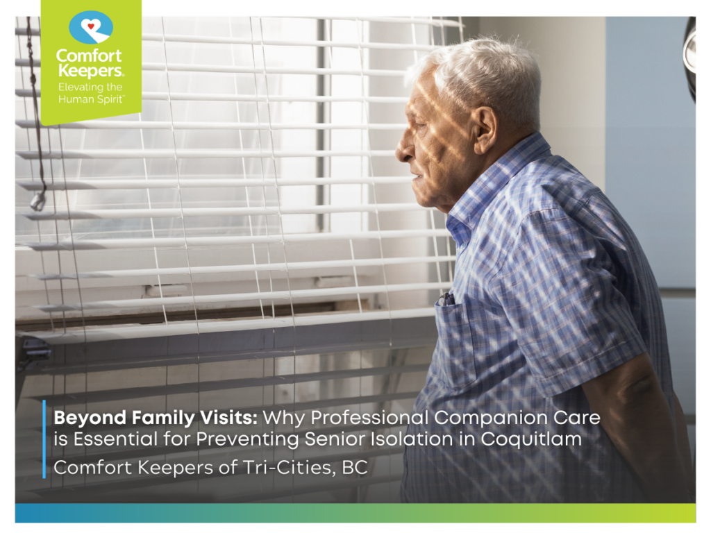 A senior man looks out the window | Beyond Family Visits: Why Professional Companion Care is Essential for Preventing Senior Isolation in Coquitlam | Comfort Keepers Tri-Cities