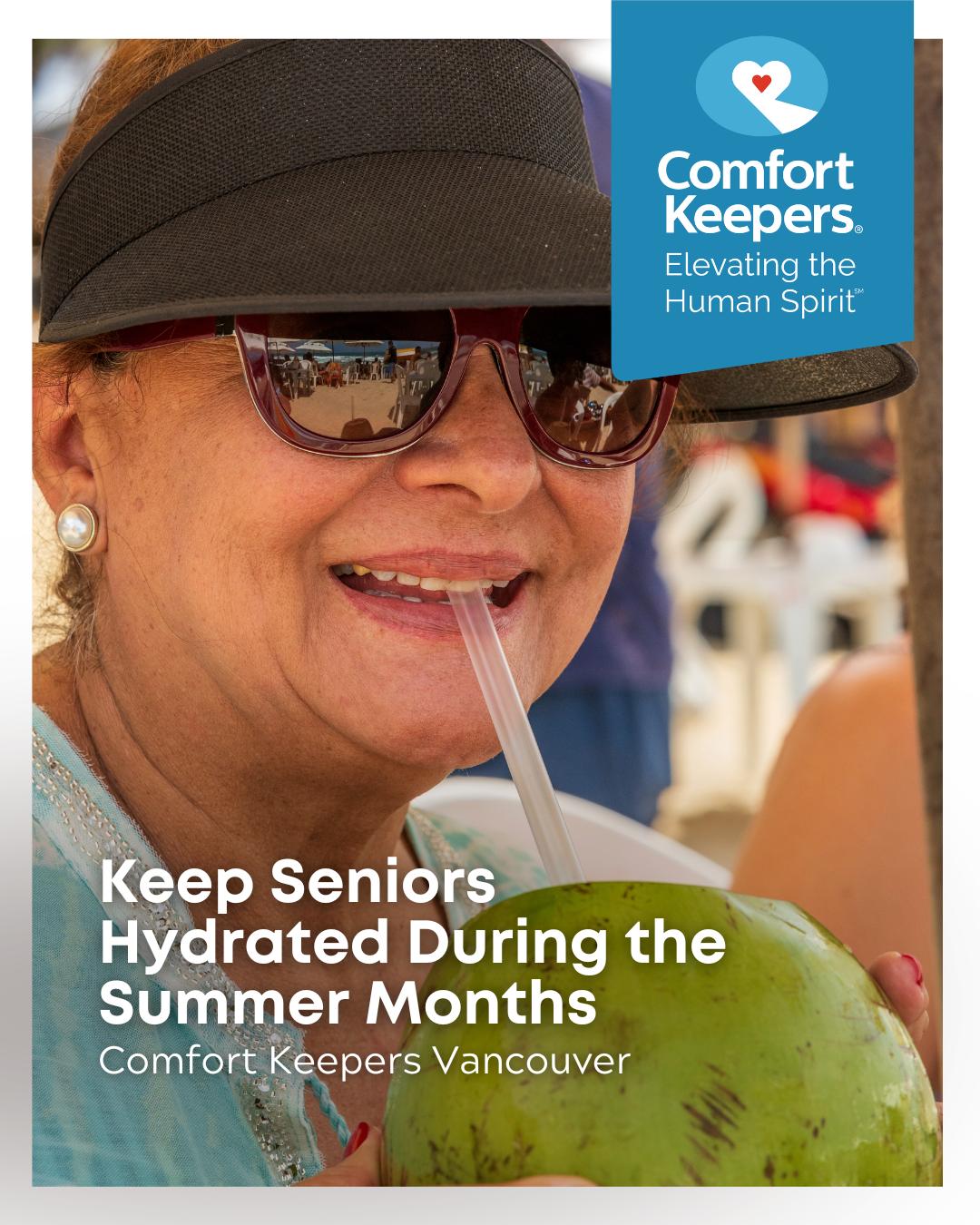A senior wearing a hat and sunglasses sips from a coconut | Keep Seniors Hydrated During the Summer Months | Comfort Keepers Vancouver | BLOG POST