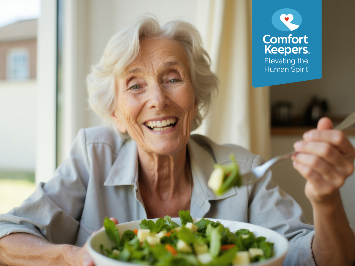 A senior woman eats a healthy salad | Here Are Some Risk Factors and Tips to Prevent Obesity in Vancouver's Seniors | Comfort Keepers Vancouver