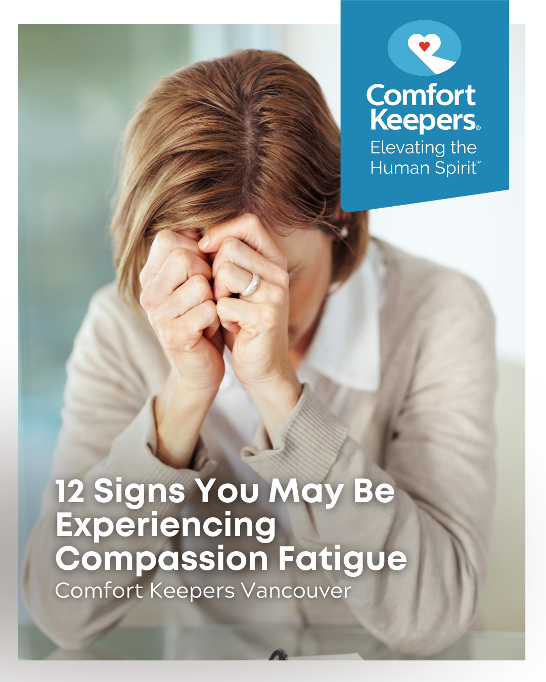 A woman holding her head in her hands, stressed | 12 Signs You May Be Experiencing Compassion Fatigue | Comfort Keepers Vancouver | BLOG POST