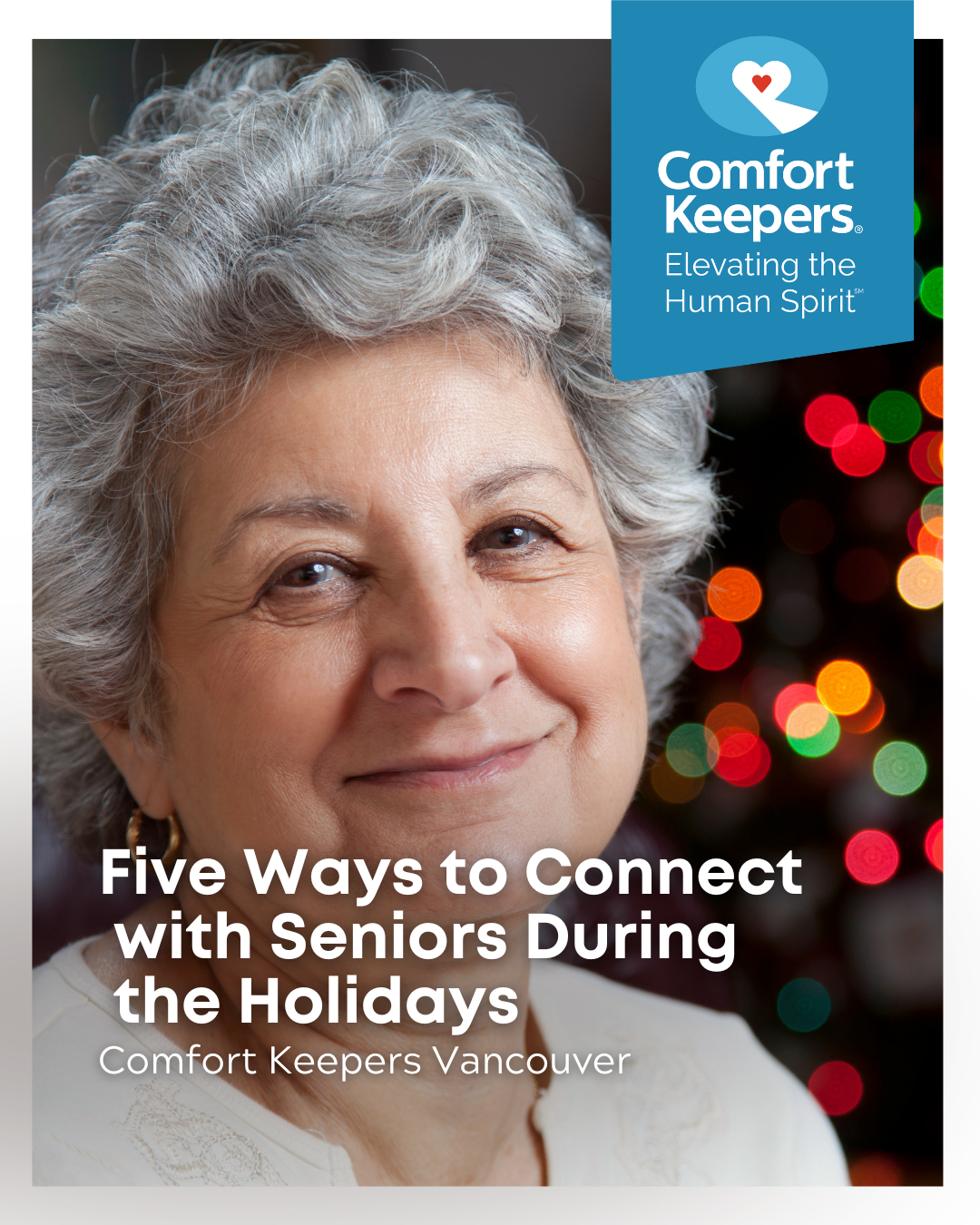 Senior woman seated in front of Christmas lights | Comfort Keepers Vancouver | Five Ways to Connect with Seniors During the Holidays | BLOG POST