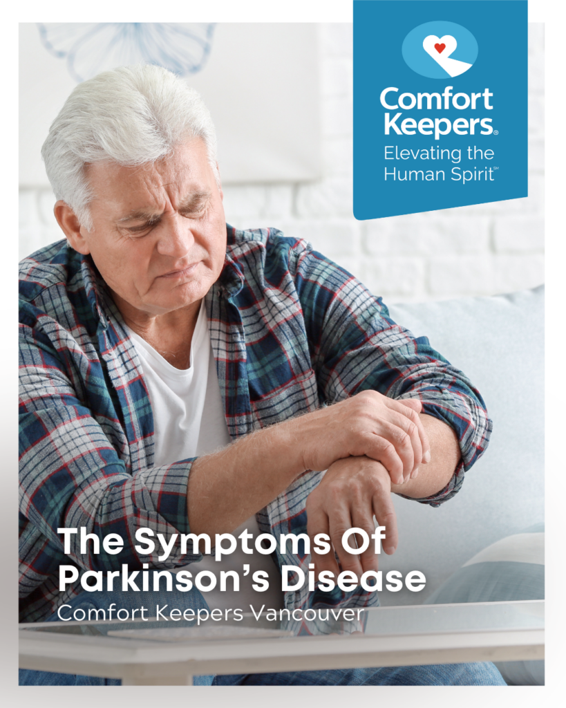 Senior male holding wrist seemingly in pain | The Symptoms of Parkinson's Disease | Comfort Keepers Vancouver | BLOG POST