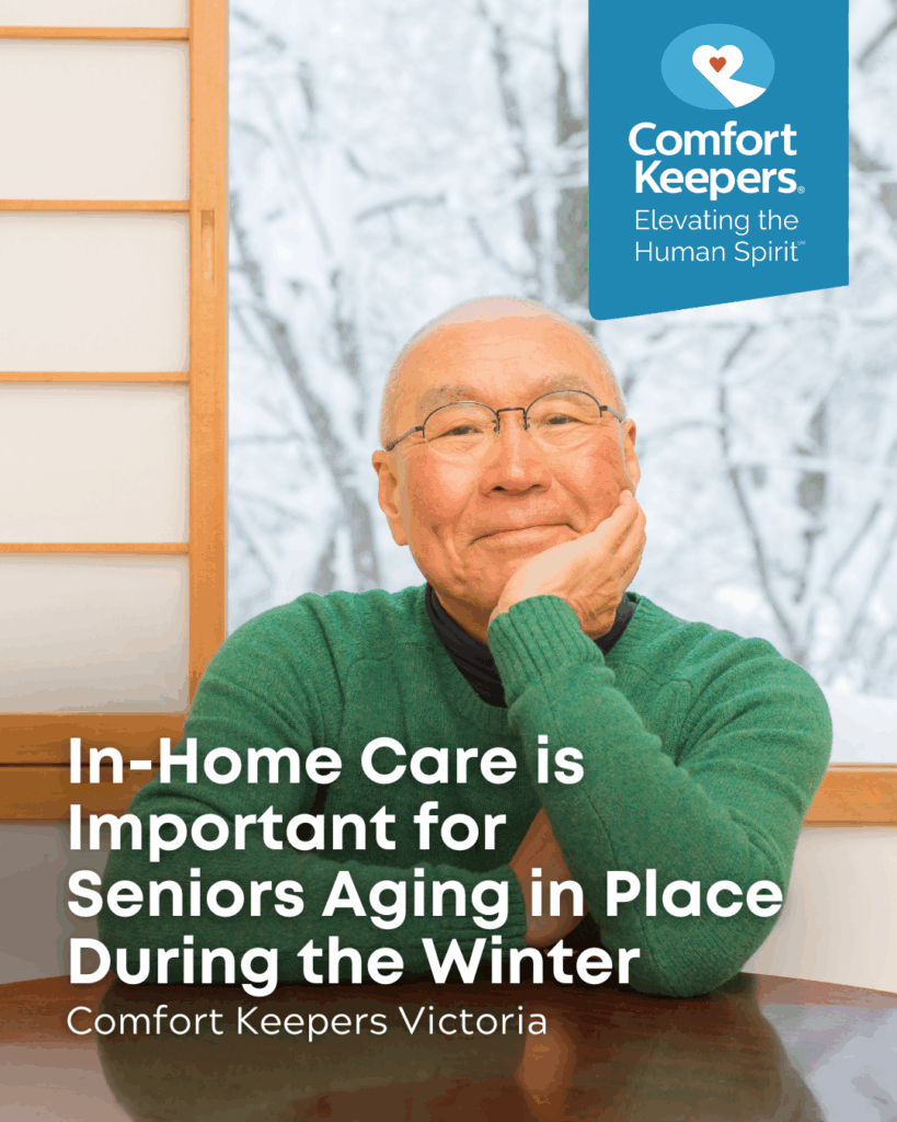 Senior male seated in front of a window that showcases a winter scene | In-Home Care is Important for Seniors Aging in Place During the Winter | Comfort Keepers Victoria | BLOG POST