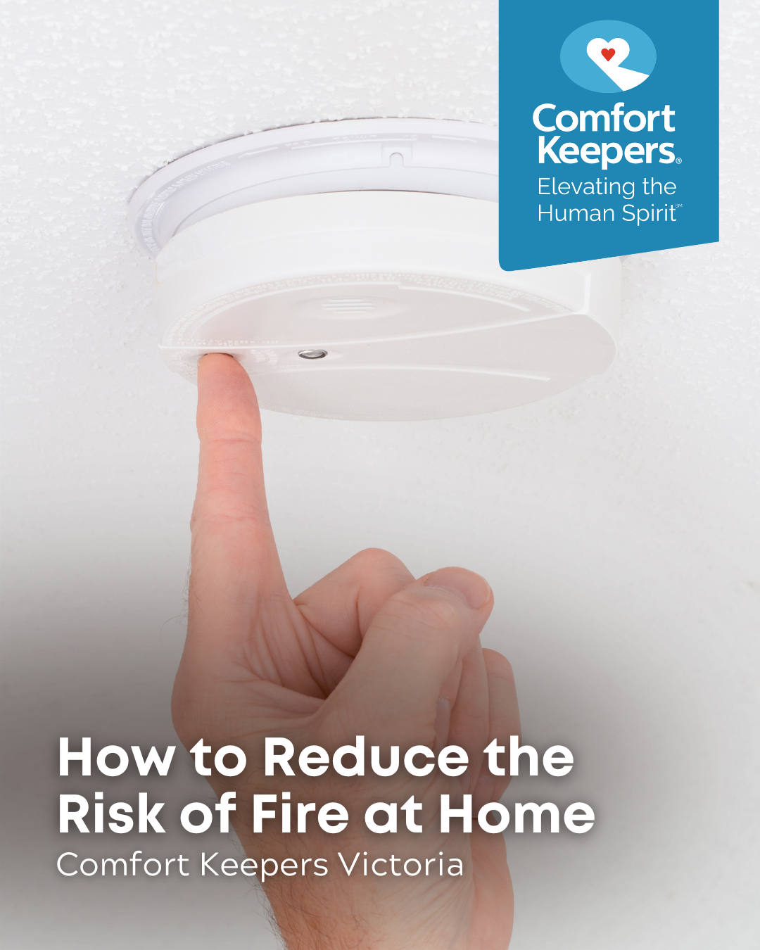 Someone turning on a smoke detector | How to Reduce the Risk of Fire at Home | Comfort Keepers Victoria | BLOG POST