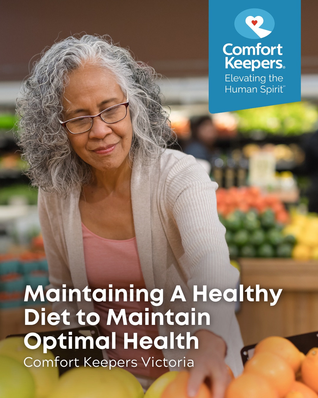 A senior woman examines fruit at the market | Maintaining A Healthy Diet to Maintain Optimal Health | Comfort Keepers Victoria | BLOG POST