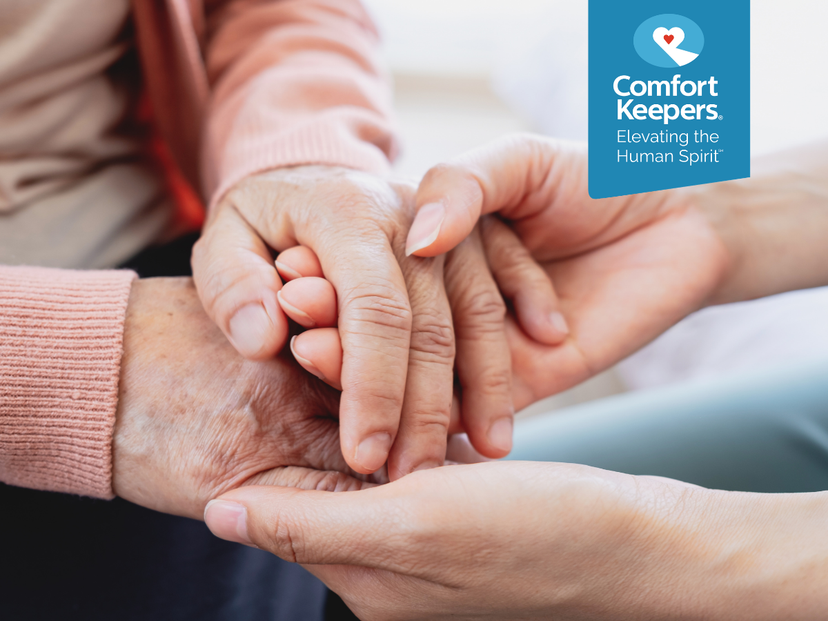 A pair of senior hands being held by another's hands | Seniors & Arthritis: What Seniors Need to Know | Comfort Keepers Victoria