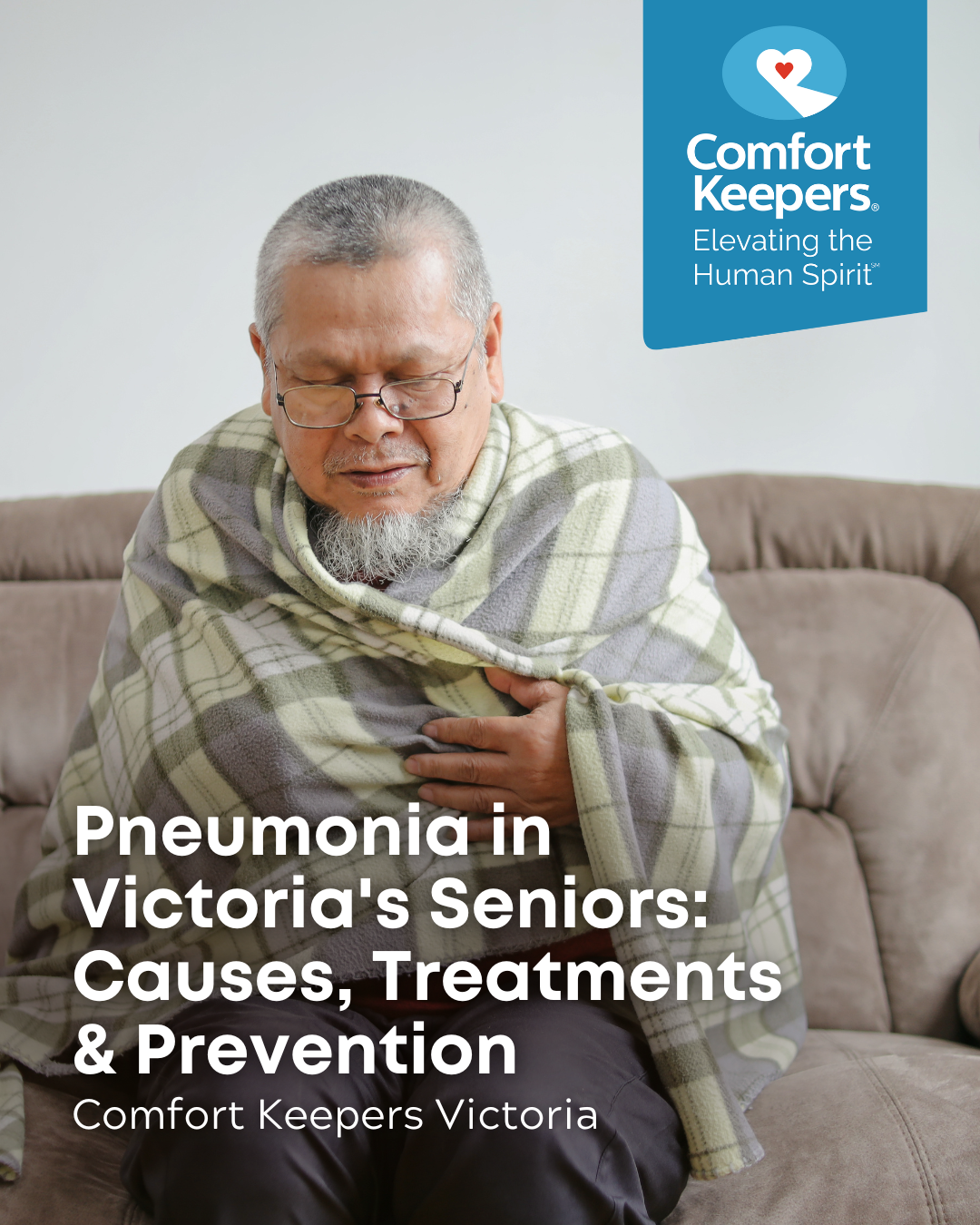A senior man seated on a couch and wrapped in a blanket | Pneumonia in Victoria's Seniors: Causes, Treatments & Prevention | Comfort Keepers Victoria