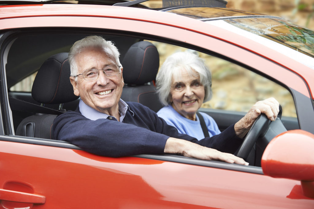Two seniors driving in a car | Seniors and Driving | BLOG POST | Comfort Keepers Victoria