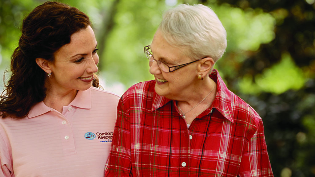 Senior female, smiling with caregiver | Alternative to Assisted Living Care | Comfort Keepers Victoria | BLOG POST