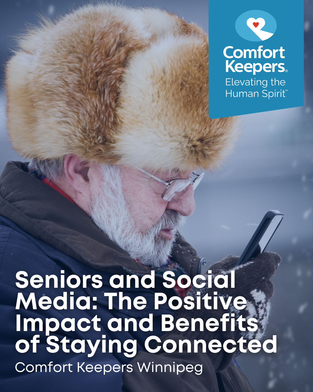 Senor male in warm winter hat looking at smart phone | Seniors and Social Media: The Positive Impact and Benefits of Staying Connected | Comfort Keepers Winnipeg | BLOG POST