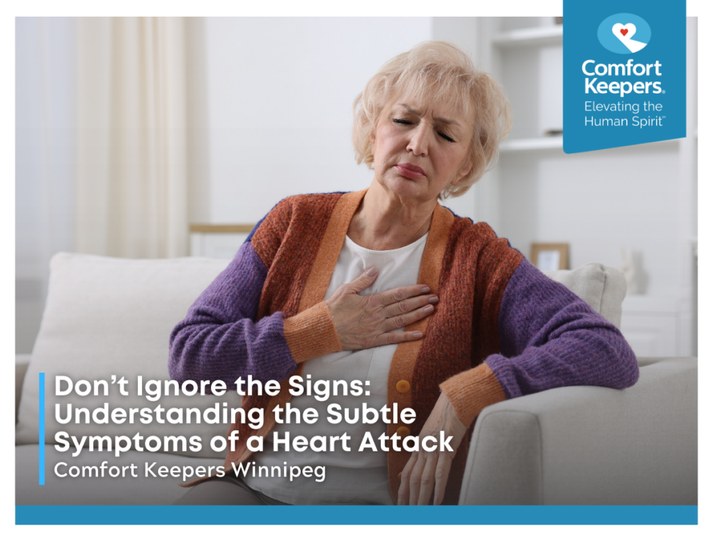 A senior woman places her hand on her chest | Don’t Ignore the Signs: Understanding the Subtle Symptoms of a Heart Attack | Comfort Keepers Winnipeg
